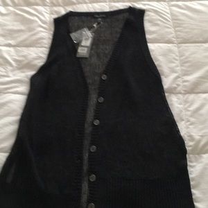 Brand new with tags light weight knit vest. 26” length front and 31” back approx